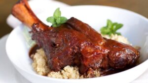 braised lamb shank on fine china
