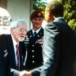 President Obama shakes hands with a veteran