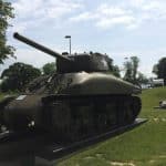 A Sherman Tank rests at a memorial